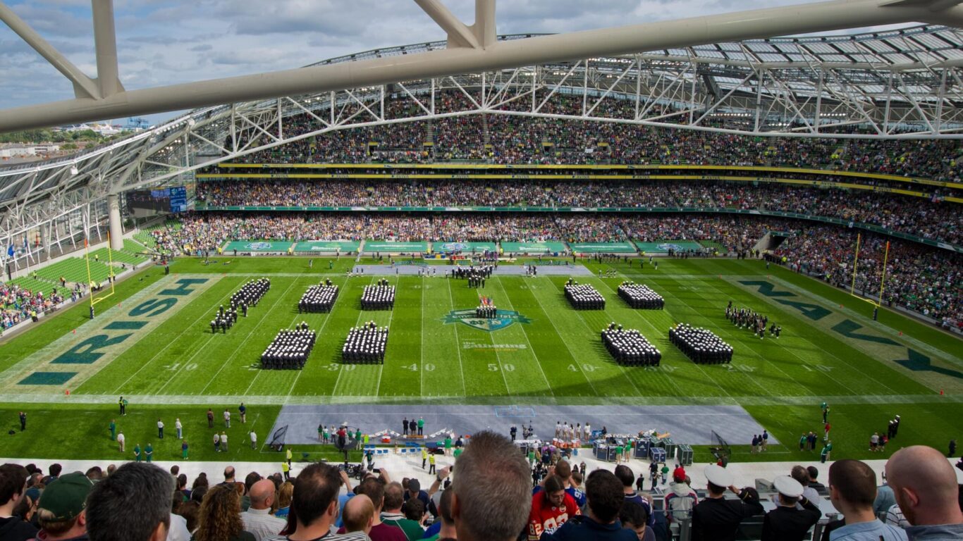 Guests enjoy a lively stadium surrounded by cheering crowds, perfect for sports fans seeking excitement near local attractions.